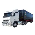 Intermodal Freight Container on truck with black side curtain