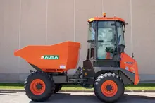 AUSA site dumpers parked on a construction site, showcasing efficient material transport for site safety and productivity.